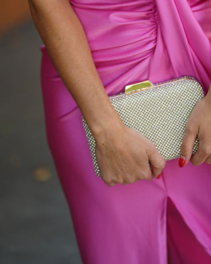 Mala de festa dourada com brilhantes